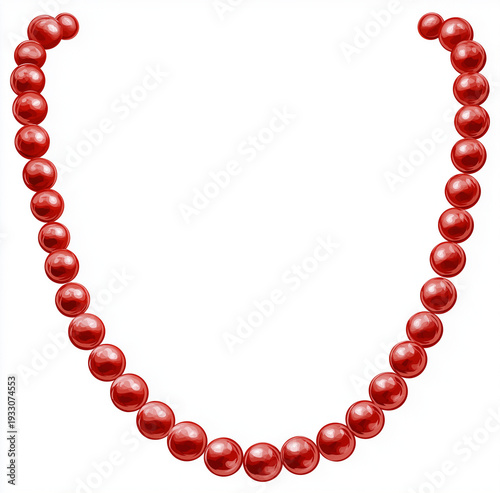 A string of vibrant red beads on a white background