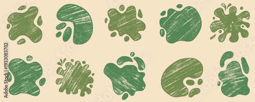 Organic green abstract splashes. Grunge blots frame for text. Crayon eco irregular shapes and textures for an abstract nature design. Fluid hand drawn stains for eco collage. Vector illustration set.