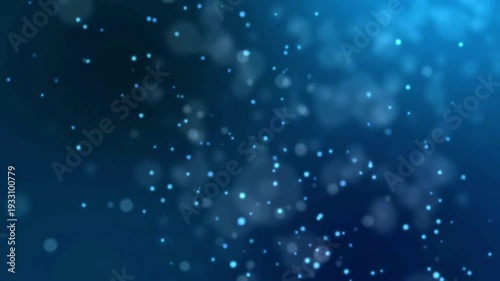 Stunning blue background with sparkling particles and bokeh effect