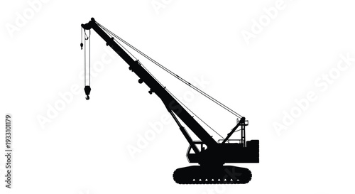 Construction crane depicted in a stark dramatic silhouette