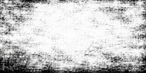 Aged black grunge background featuring a rough textured wall surface with a dirty liquid paint design and a cold grey ice pattern for an old grungy paper backdrop