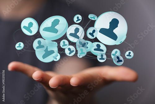Image shows a hand holding ...
