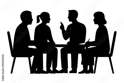 A group of people sitting around a table