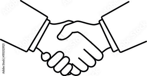Two business hands shake firmly above their wrists in agreement.