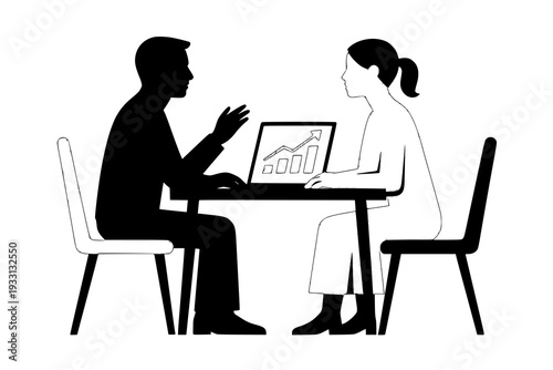 A man and woman discuss a graph on a laptop