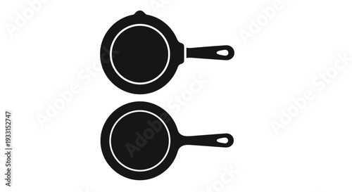 Two black frying pans depicted in a stark graphic silhouette