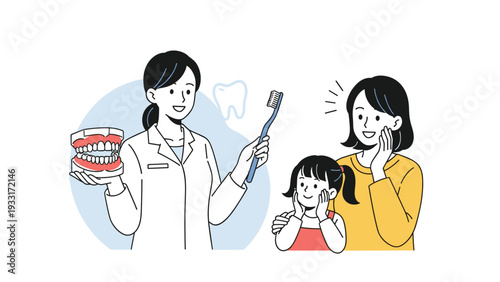 Friendly female dentist showing a set of teeth models and a large toothbrush to a young mother and her curious daughter.