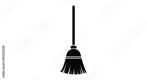 A stark black silhouette depicts a traditional broom standing upright against a white background silhouette high quality professional