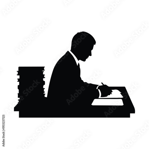 Businessman working diligently at modern office desk