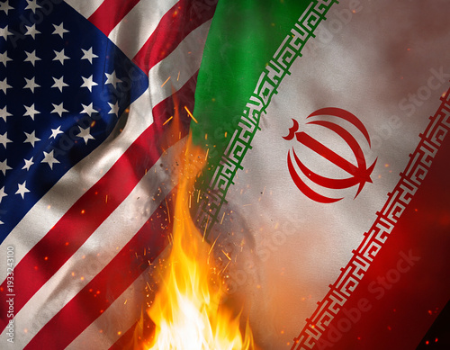 United States of America flag vs Iran flags with flames between. Conflict, war