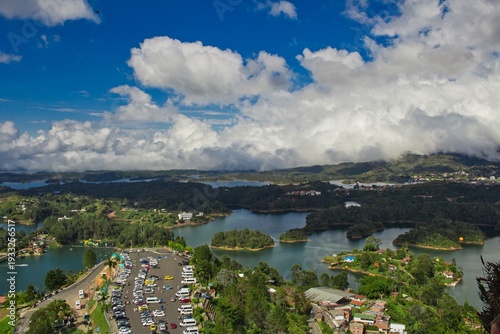 Stunning landscape of El Peñol Stone in Guatapé, Colombia. Iconic monolith with zigzag stairs and panoramic reservoir views. Ideal for travel, tourism, and South American nature photography.