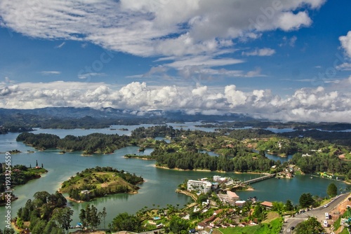 Stunning landscape of El Peñol Stone in Guatapé, Colombia. Iconic monolith with zigzag stairs and panoramic reservoir views. Ideal for travel, tourism, and South American nature photography.
