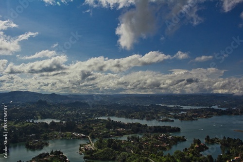 Stunning landscape of El Peñol Stone in Guatapé, Colombia. Iconic monolith with zigzag stairs and panoramic reservoir views. Ideal for travel, tourism, and South American nature photography.