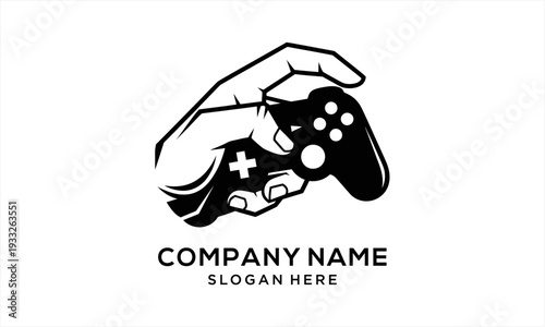 Hand holding a modern video game controller for gaming entertainment.