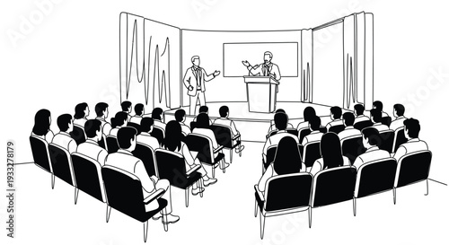 A speaker presenting to a large audience in a conference hall