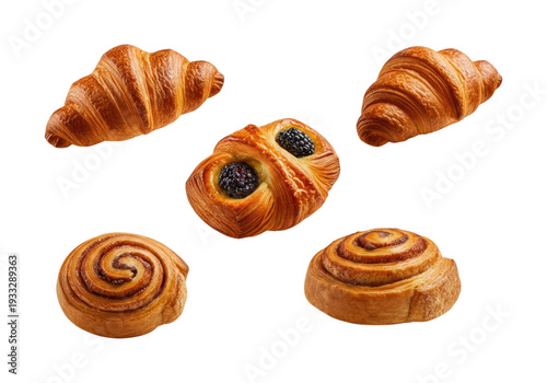 Assortment of golden brown pastries including croissants, cinnamon rolls and a berry danish on a transparent background