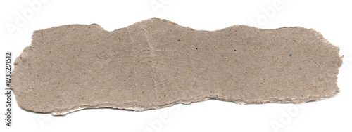Rough textured ripped brown recycled cardboard paper element with ragged torn edges