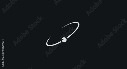 Minimalist depiction of an atom on black background