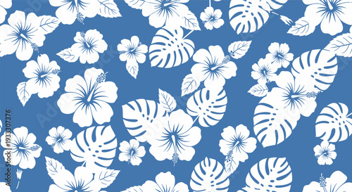 Seamless blue floral pattern with white tropical flowers and leaves.