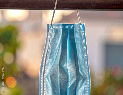 Blue Surgical Mask Hanging Indoors, Health Protection