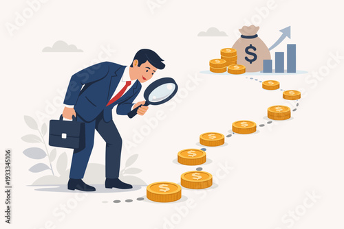 Businessman in suit looking through magnifying glass at trail of gold coins leading to money bag and growth chart, concept of searching for investment opportunities and financial success.