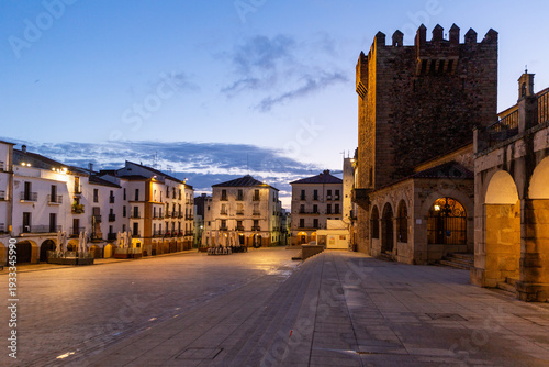Morning view of Plaza Mayor with Torre de Bujaco in historic Caceres