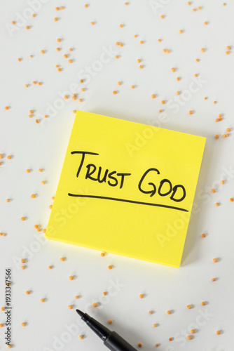 Trust God, inspirational handwritten note with mustard seeds on white background. Faith in Jesus Christ, biblical concept.