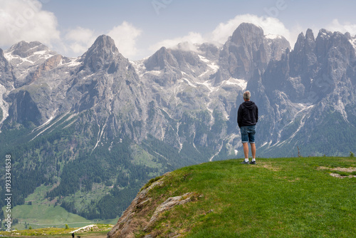 Hiker on top of mountain, Italian Dolomites