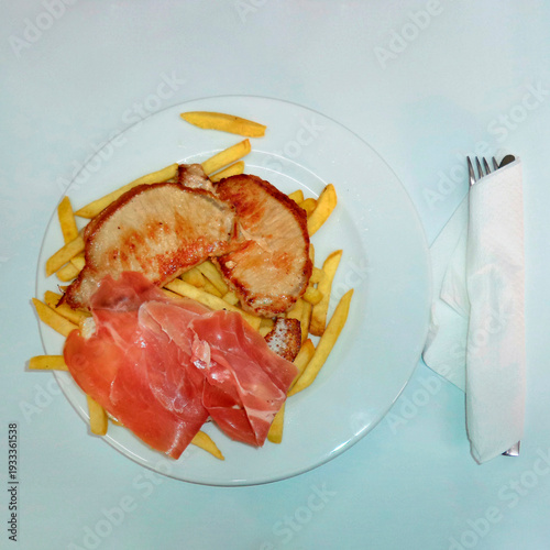 Savory Brunch-Style Breakfast Pork Chops, Serrano Ham, and French Fries