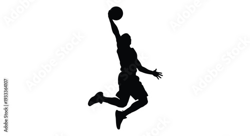 Silhouette of a basketball player in mid air preparing to dunk the ball