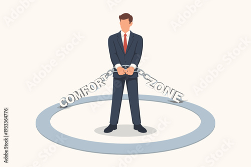 Businessman in Suit Standing Inside a Circle with Hands Shackled by Chains Forming the Words Comfort Zone, Representing Psychological Barriers, Fear of Change, and Career Growth Stagnation.