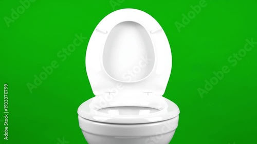 White toilet bowl with open lid in modern minimalist style with bright studio lighting on green background for bathroom advertising
