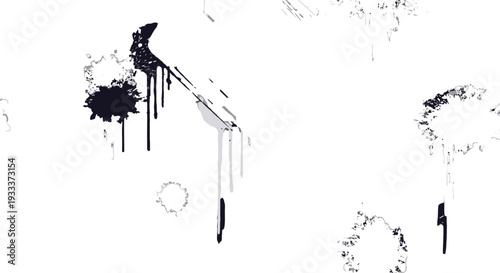 Abstract black ink splatters on white background with dripping effect.