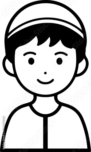 Smiling boy wearing traditional Muslim cap and kurta