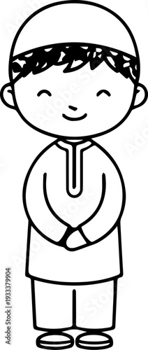 Smiling boy wearing traditional Muslim cap and kurta