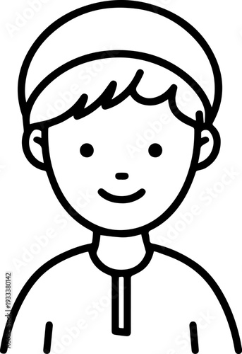 Smiling boy wearing traditional Muslim cap and kurta