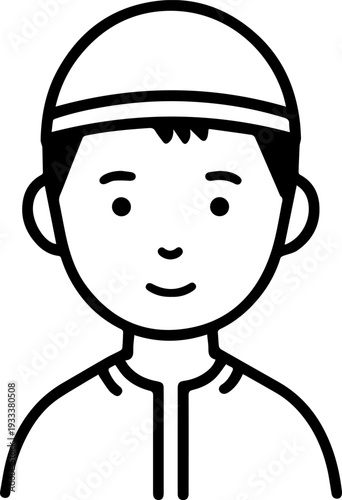 Smiling boy wearing traditional Muslim cap and kurta