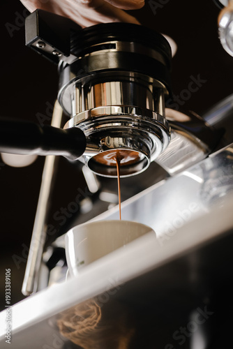 Espresso Extraction from Professional Coffee Machine Close-Up