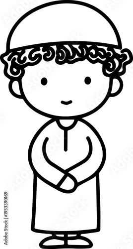 Smiling boy wearing traditional Muslim cap and kurta