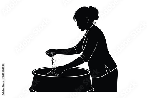 Woman Washing Clothes in Basin: Domestic Chore Silhouette