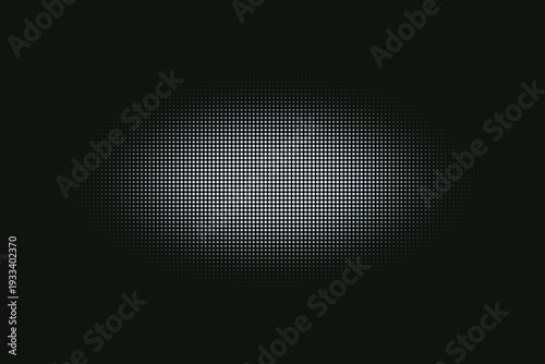 Tiny white and light green dots form a soft glowing oval shape on a deep dark surface