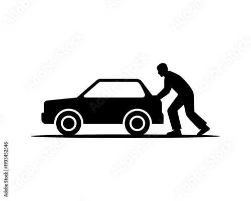 A man pushing a car on the side of the road with effort and determination
