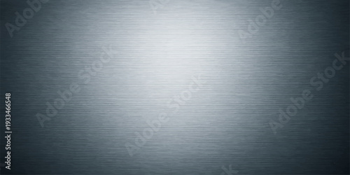 Metallic Texture: A sleek, brushed metal surface, subtly reflecting light and shadow. The industrial feel, perfect for backgrounds, textures and design. 