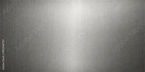 Brushed Metal Texture: An elegant display of brushed metal, with its sleek surface reflecting light. The image captures the textures, patterns, and sheen of the material.