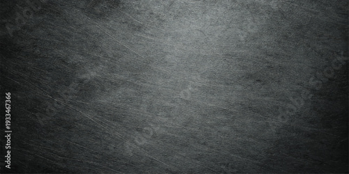 Textured Graphite Backdrop: A high-resolution, textured graphite surface, evoking a sense of industrial rawness and understated elegance. Perfect for conveying a modern, minimalist aesthetic. 