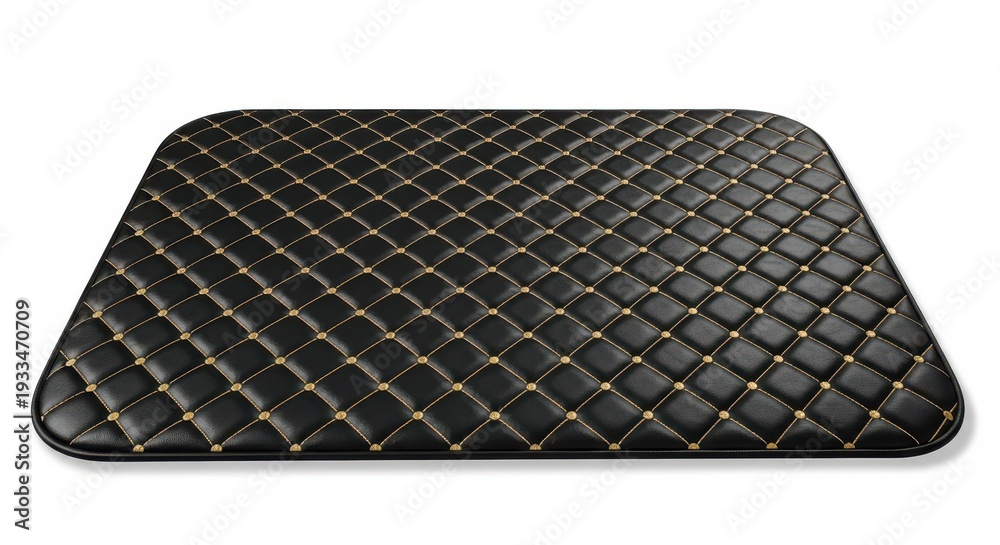 Obraz premium Luxurious black floor covering features diamond quilting with golden accent stitching