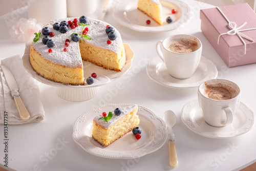 Tasty Basque cheesecake served on table for two.