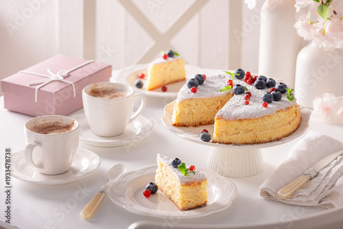 Tasty Basque cheesecake served with blueberries and raspberries.