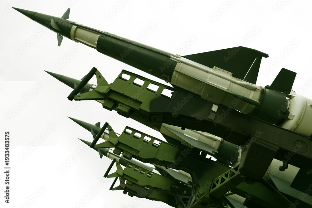 Obraz premium missile with a warhead isolated on white background. Weapons of mass destruction, chemical, nuclear. artillery set of rocket bomb rocket to launch. Missiles with warheads. War, fire, attack, threat