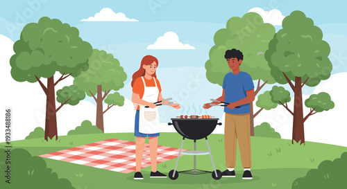 Happy young couple enjoying a summer outdoor barbecue picnic in the park grilling delicious food on sunny weekend afternoon together.